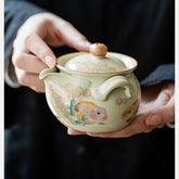 Ru Kiln Goldfish Handheld Teapot – 200ml